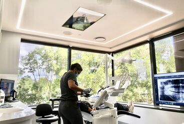 Dental treatment center with monitor for digital scanning in a practice.